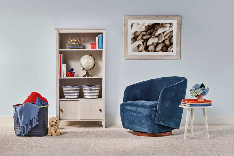 plush gray carpet in blue kids room with velvet armchair